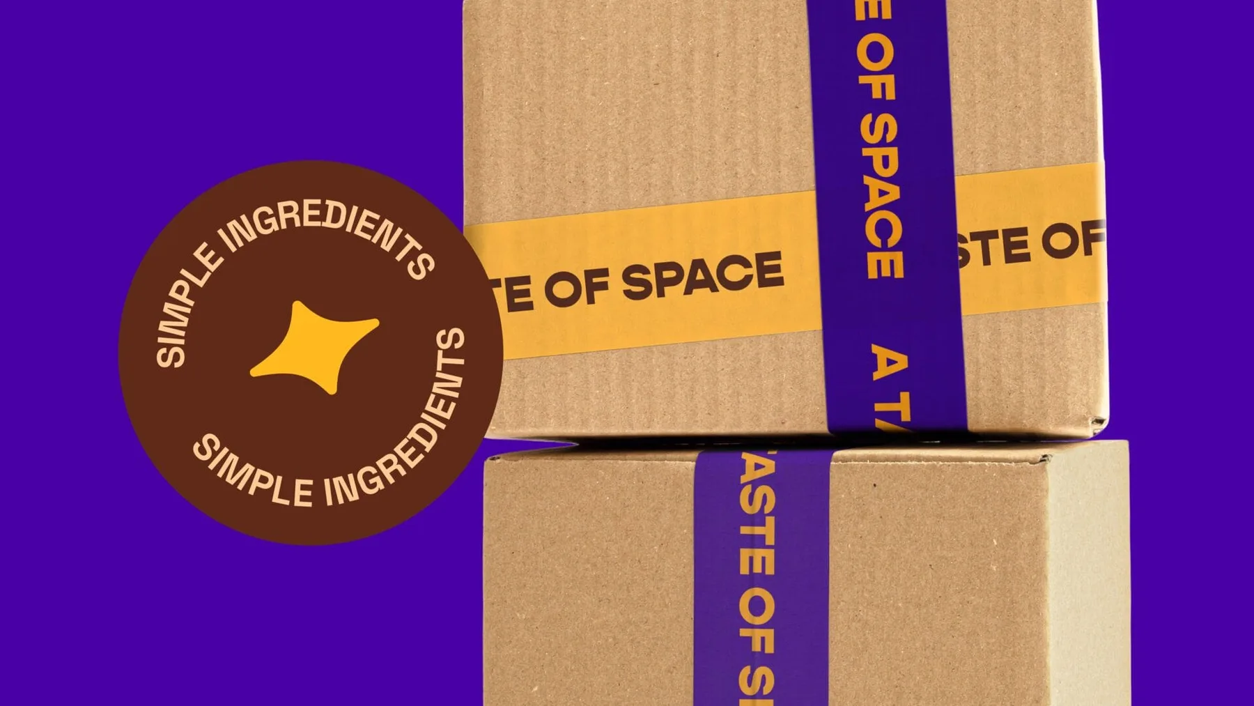 CocoFro kraft boxes wrapped with purple and yellow A Taste of Space tape