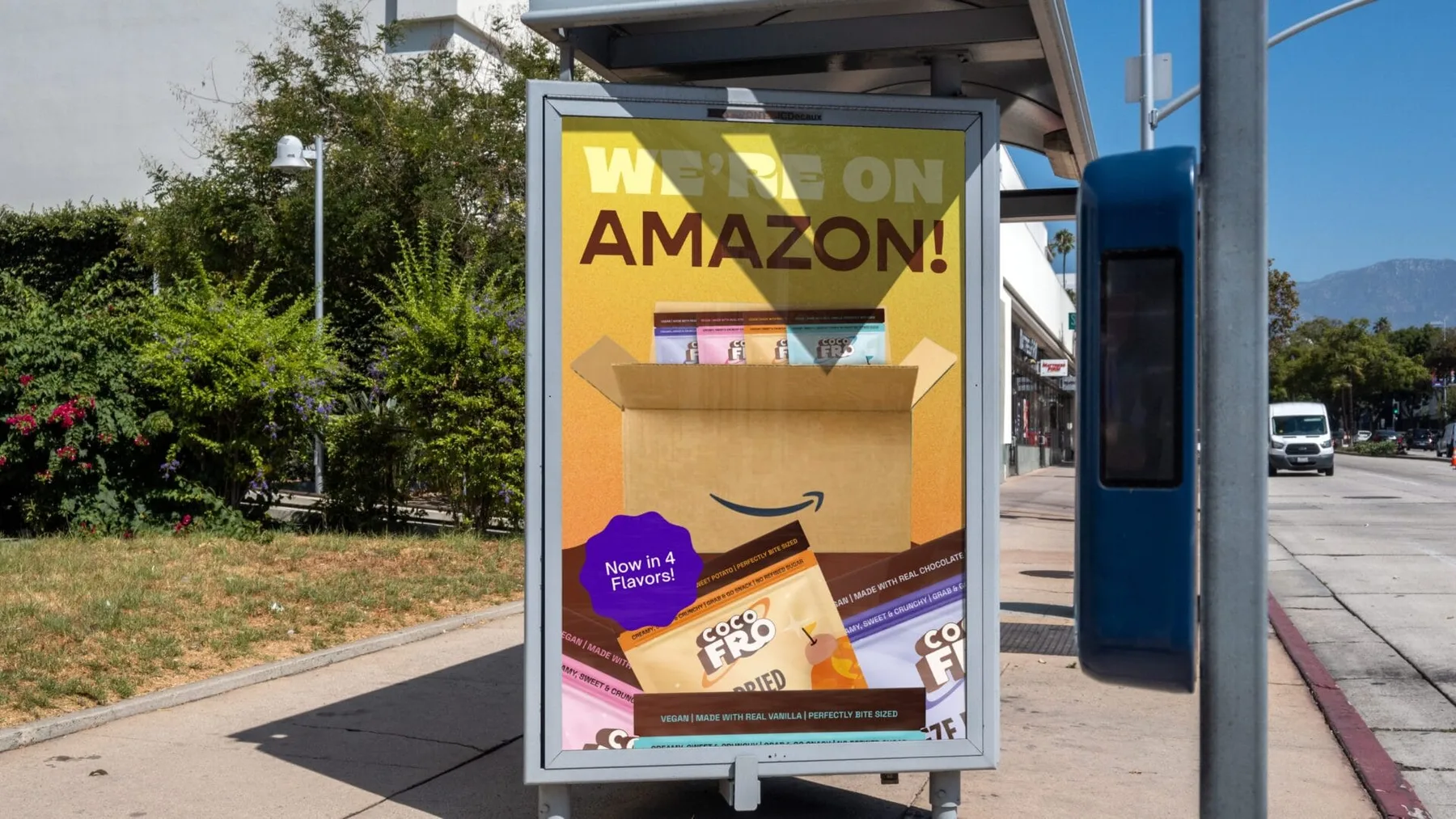 CocoFro Amazon campaign artwork shown in a bus shelter mockup
